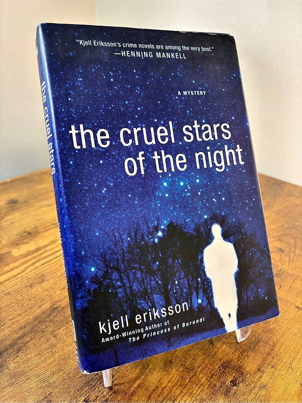 Thomas Dunne Books The Cruel Stars of the Night Hardcover Book Blue